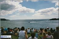 The crowds on Plymouth Hoe watch the race